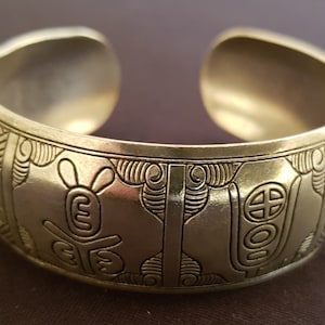 Handcrafted Chinese Miao silver tribal adjustable bangle with chinese characters and motifs from Guizhou Province, China