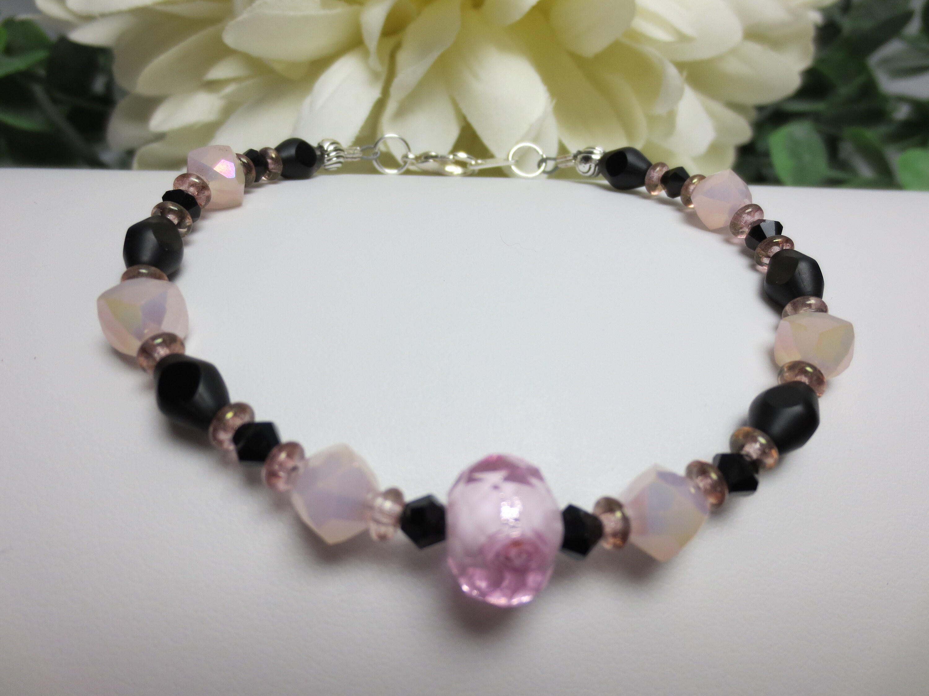 Black Bracelet with Pink Accent