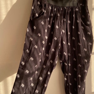 black cotton ankle-length pants w zebra emblem