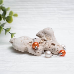 7" Tin Cup Orange & White Freshwater Pearl Bracelet  - Perfect for University of Tennessee fans.
