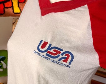 Vintage 70s USA United Spirit Association Red, White, and Blue Cheerleading T-Shirt