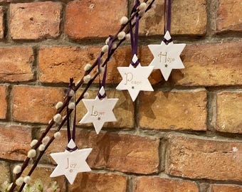 Peace, joy, love and hope Christmas star decorations - Set of four.