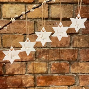 Peace, joy, love, hope & Jesus Christmas star decorations - Set of five.