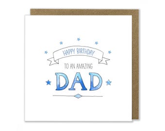 May include: A square birthday card with a white background and a brown envelope. The card features the text "HAPPY BIRTHDAY TO AN AMAZING DAD" in blue watercolor lettering, with blue star accents.