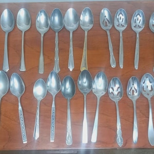 Lot of 29 mismatched vintage serving utensils - serving Spoons, meat forks