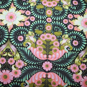 May include: A black fabric with a repeating pattern of pink and white flowers, green leaves, and teal swirls.