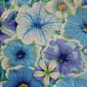 May include: Close-up of a fabric with a repeating floral pattern. The flowers are in shades of blue, white, and green. The petals have intricate vein details, and the overall design is reminiscent of petunias.