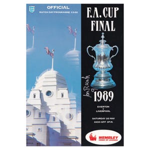May include: A vintage match day program cover for the 1989 F.A. Cup Final. The design features the F.A. Cup trophy, the Wembley Stadium, and the teams Everton vs. Liverpool. The program is dated Saturday, May 20.