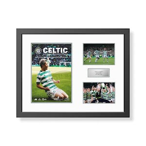 May include: Framed print celebrating a Celtic football victory. The print includes a large image of a player in a green and white striped jersey, action shots of the team, and a commemorative plaque with the text "Celtic 3 - Hearts 0".