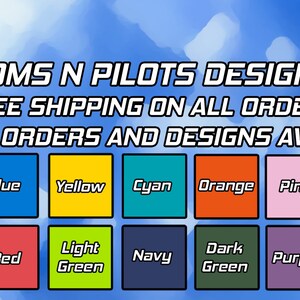 May include: A graphic with the text "POMS N PILOTS DESIGNS" and "FREE SHIPPING ON ALL ORDERS" and "CUSTOM ORDERS AND DESIGNS AVAILABLE".  The graphic also shows a black helicopter and a color chart with 18 different color squares.