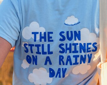 El sol aún brilla en la camiseta gráfica