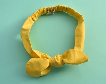 Liberty print bow tie hairband in bright yellow, retro inspired