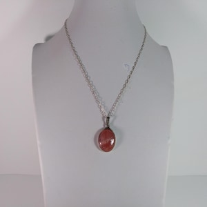 Rhodochrosite mineral pendant, set in 925 Silver.