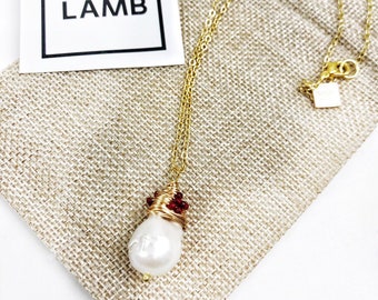Handmade Wrapped Ruby Baroque pearl pendant on fine gold chain. Free Shipping.