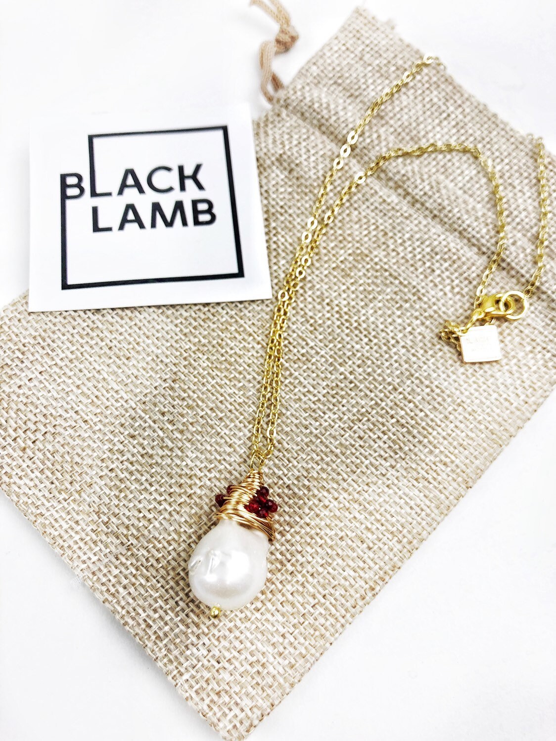 Handmade Wrapped Ruby Baroque pearl pendant on fine gold chain. Free Shipping.