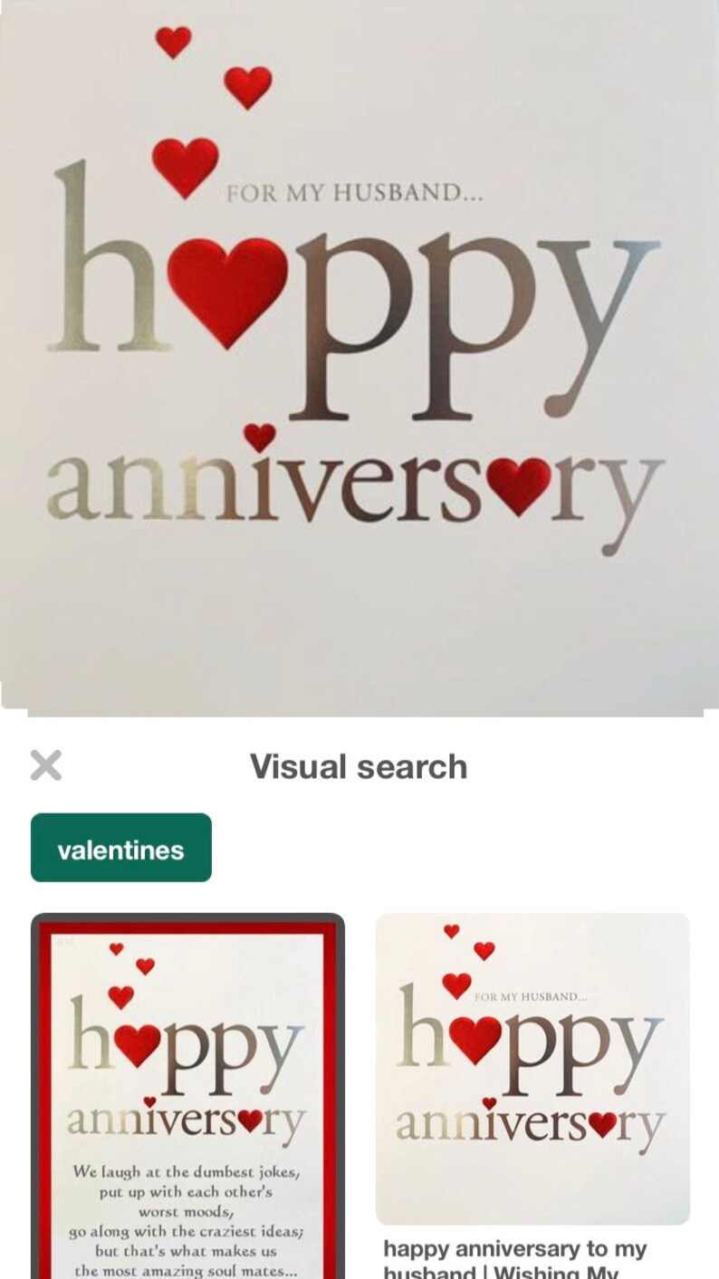 May include: A white anniversary card with the words "hoppy anniversary" in silver and red. Red hearts are scattered around the text. The phrase "FOR MY HUSBAND..." is above the word "hoppy".