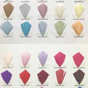 May include: A chart of 30 different colored feathers, each labeled with a color name and a code. The feathers are arranged in rows of five, with each row representing a different color family.