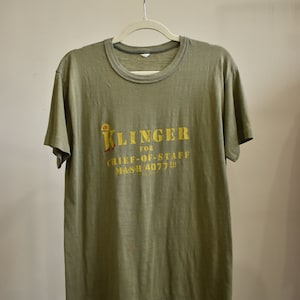 Vintage M*A*S*H* 4077th Klinger Single Stitch Olive Drab Paper Thin THRASHED 70s 80s Tee Shirt // Army Military Hawkeye Medium Large