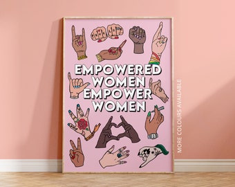 May include: Pink poster with the text "Empowered Women Empower Women" and illustrations of hands making different gestures. The hands are in various skin tones and have different tattoos and nail polish colors. The text "More Colors Available" is on the right side of the poster.