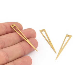 May include: Gold-colored metal earring components in a geometric triangular shape. Each component has a small hole at the top for attachment. The earrings are shown against a white background.
