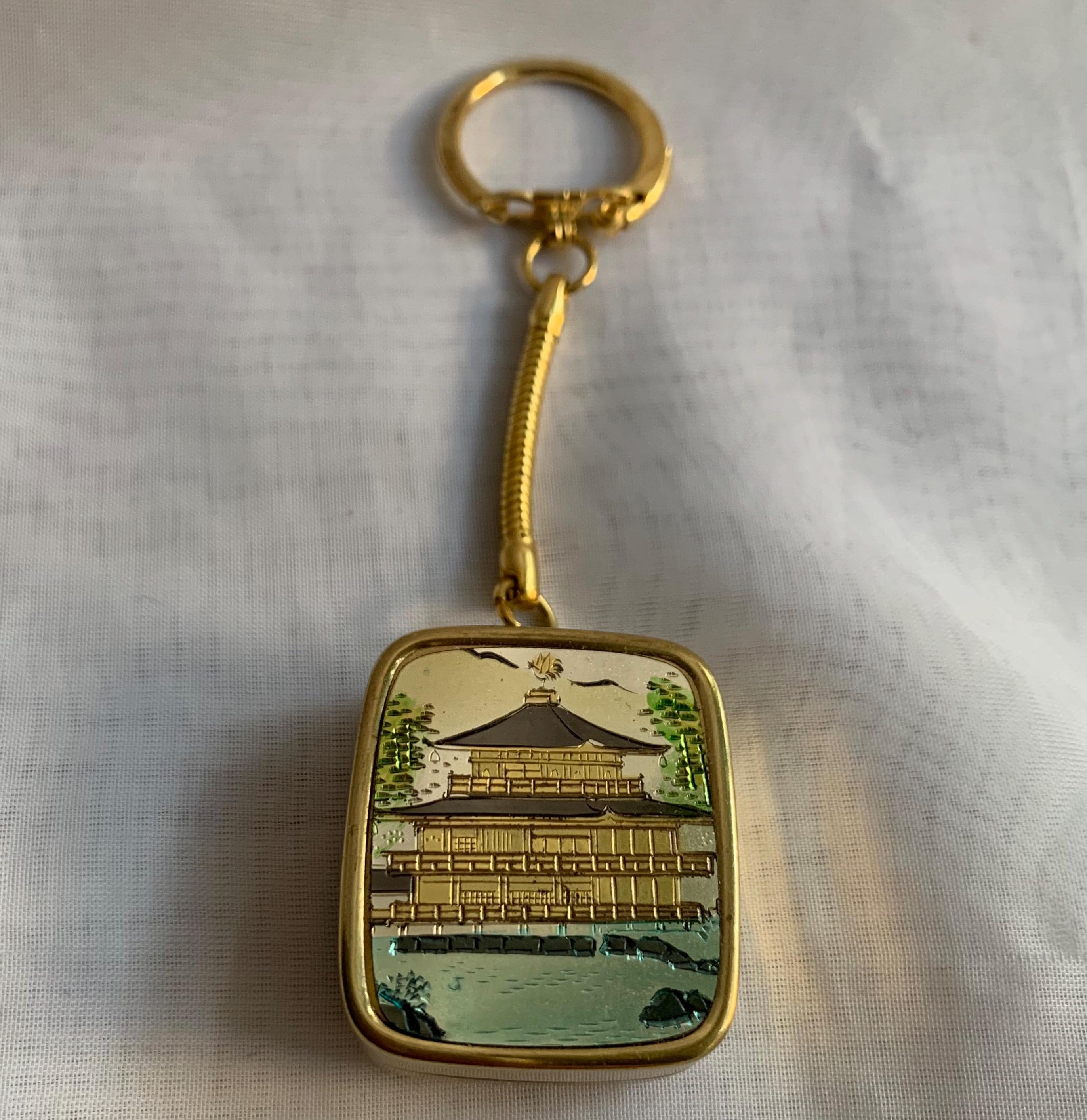 Vintage Sakura Gold Tone Music Box Keychain With Sankyo Vintage Sakura Gold Tone Music Box Keychain With Sankyo