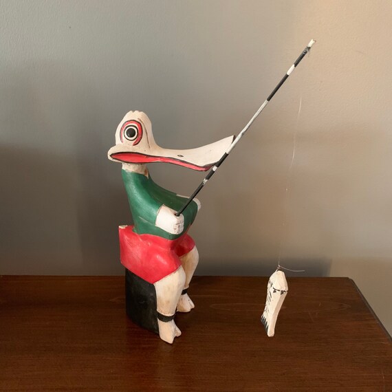sitting ducks fishing pole