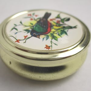 Vintage Round Pill Box, Gold tone metal, Colorful bird in tree branches, plastic insert