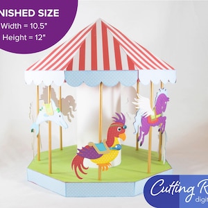A papercraft carousel with a red and white striped roof, a white base, and a green platform. The carousel has eight animals: a red horse, a multicolor parrot, a yellow giraffe, a blue elephant, a yellow lion, and a purple unicorn, and violet Pegasus. The carousel is a digital download and is available in SVG format and measures 10.5" wide by 12" tall when fully assembled. A banner says it is about 10.5 inches wide and 12 inches high.