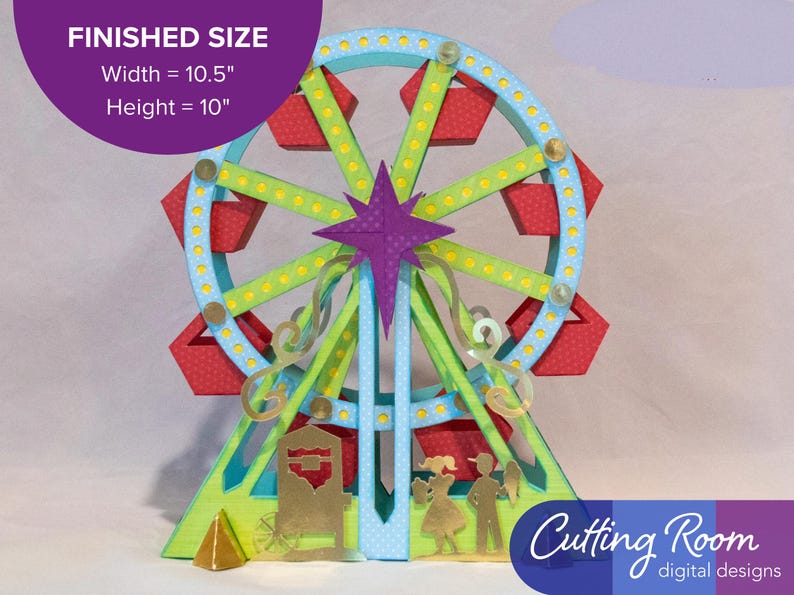 A papercraft model of a Ferris wheel with red and blue gondolas, green supports, and a purple star at the top. The model is on a green base with a gold cart and two figures standing in front of it.  There is a banner indicating that the Ferris wheel is about 10.5 inches wide and 10 inches tall.