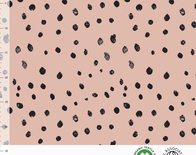Biologische tricot stof met zwarte stippen. Elvelyckan Pippi Dots (009)