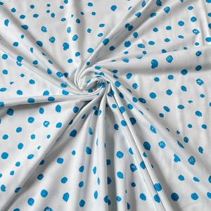 Organic jersey fabric with blue dots. Elvelyckan Pippi Dots, organic cotton