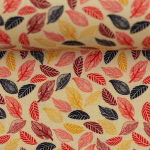 Beige woven cotton with brown, orange and red leaves. Woven fabric. 100% cotton.