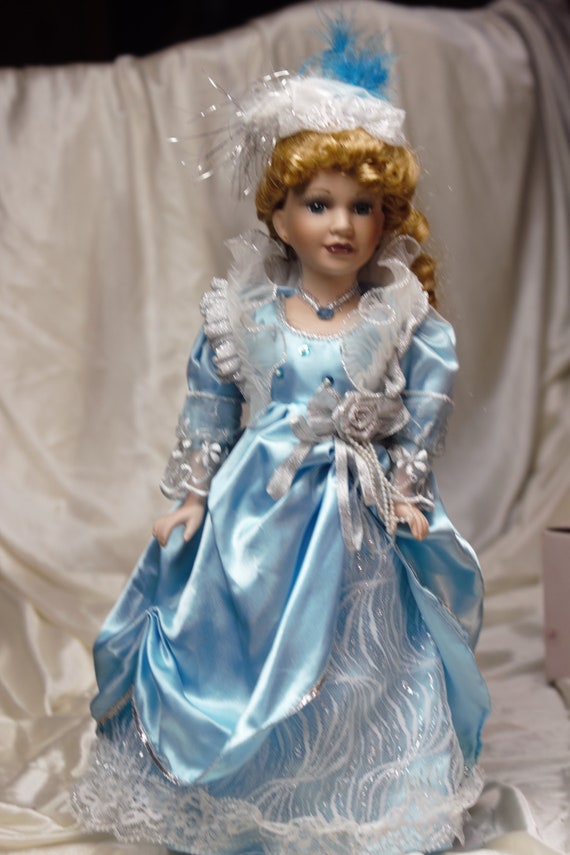 porcelain doll blue dress