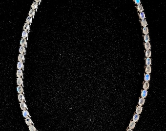 Blue Flash Moonstone Oval Tennis Necklace: Platinum Over Sterling Silver