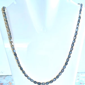 London Blue Topaz Tennis Necklace, Platinum Over Sterling Silver.
