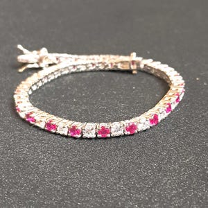 Ruby & Moissanite Tennis Bracelet: Platinum Over Sterling Silver