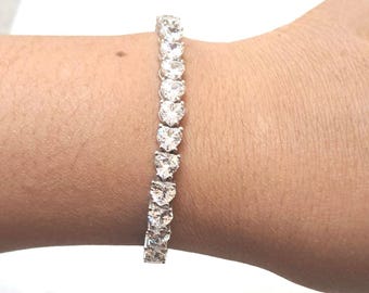 Heart Moissanite Tennis Bracelet: Platinum Over Sterling Silver
