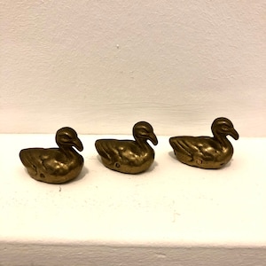 Vintage set of 3 solid brass ducks