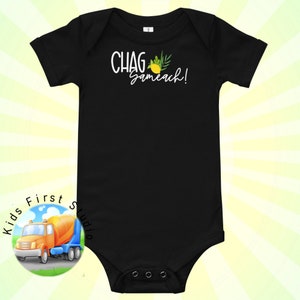 May include: Black baby onesie with white text that reads "Chag Sameach!" and a small lemon and leaf graphic.