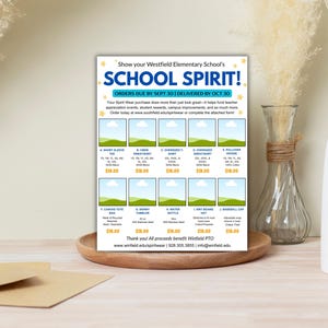 Puede incluir: Un folleto impreso para la ropa de School Spirit de la escuela primaria Westfield. El folleto muestra varias opciones de ropa, incluyendo camisetas de manga corta, sudaderas y una bolsa de lona. El texto dice "ORDERS DUE BY SEPT 30 DELIVERED BY OCT 30".