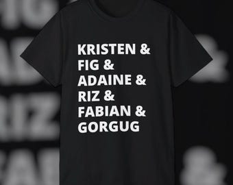 May include: Black t-shirt with white text that reads "KRISTEN & FIG & ADAINE & RIZ & FABIAN & GORGUG"