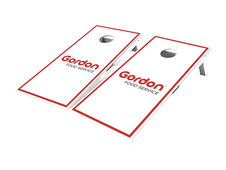 May include: Two white cornhole boards with red trim and the logo "Gordon Food Service" printed in red.