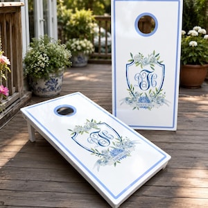 Custom Wedding Monogram Cornhole Boards Set with personalized logo and bags. A perfect personalized wedding gift or groomsman gift for weddings, receptions, and backyard games. Our custom cornhole boards feature a premium monogram cornhole design, custom logo boards and wedding decal options. Ideal as a custom game board, cornhole board, corn hole boards or cornhole score board for unforgettable celebrations.