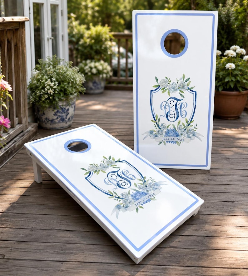 Custom Wedding Monogram Cornhole Boards Set with personalized logo and bags. A perfect personalized wedding gift or groomsman gift for weddings, receptions, and backyard games. Our custom cornhole boards feature a premium monogram cornhole design, custom logo boards and wedding decal options. Ideal as a custom game board, cornhole board, corn hole boards or cornhole score board for unforgettable celebrations.