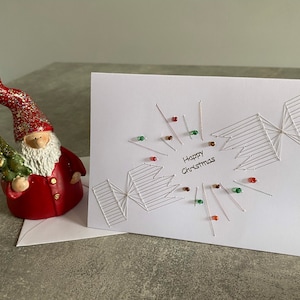 Handmade Christmas Cracker Card: Sewn Thread Design
