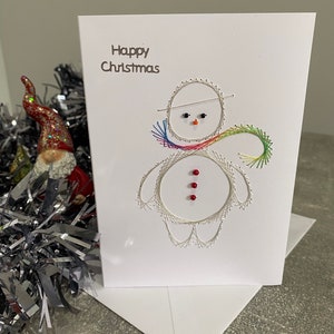 Carte de Noël faite à la main, bonhomme de neige.  cousu à la main cousu à la main