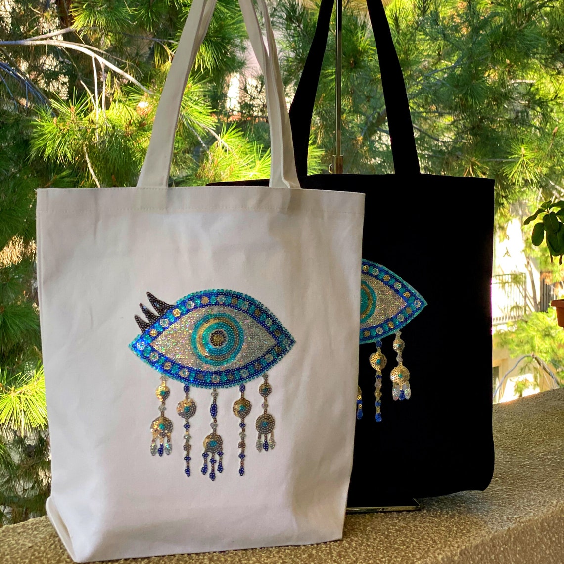 CHERRY BLOSSOM EVIL EYE BAG