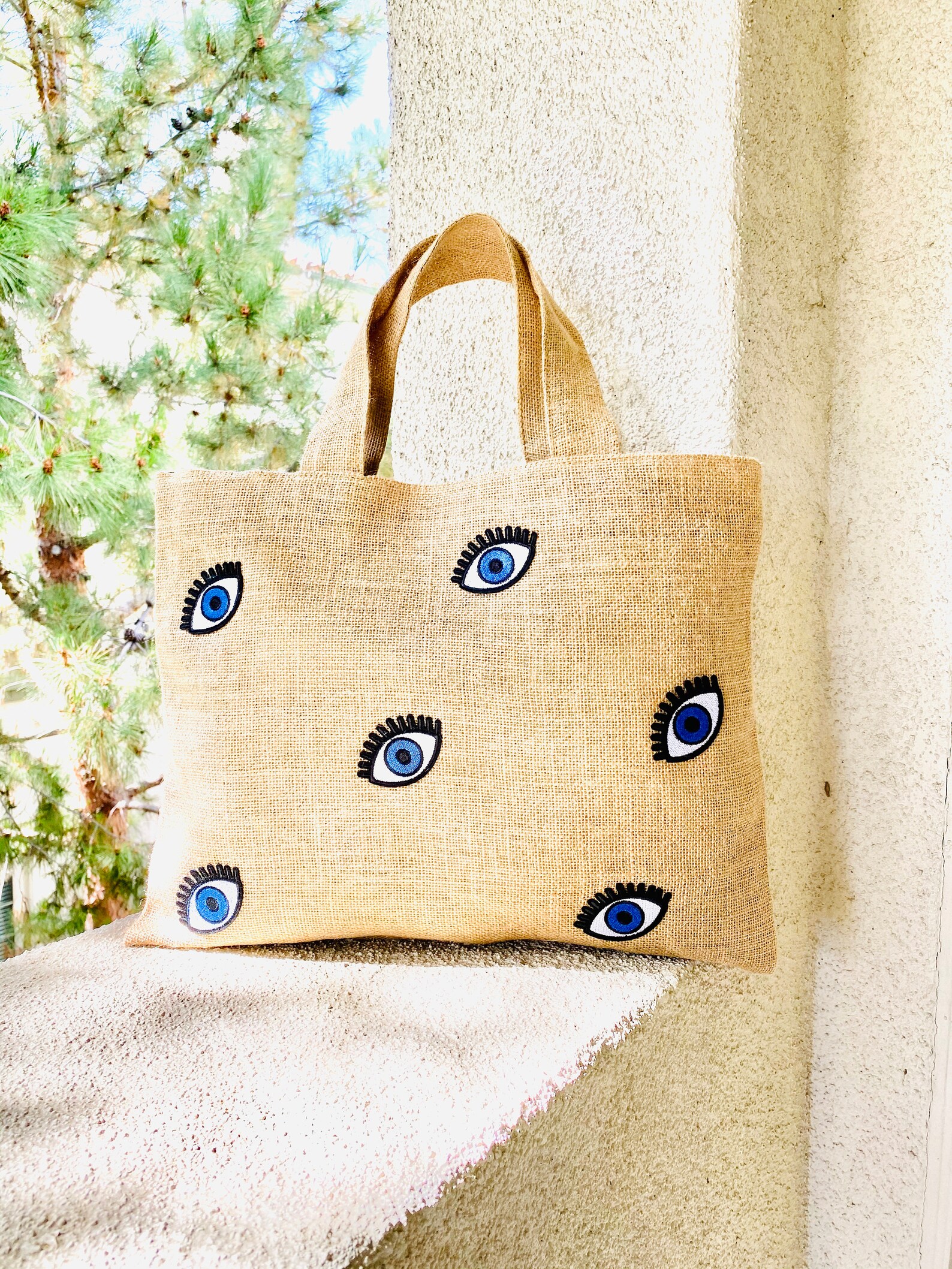 thumbnail image 2 of Evil Eye Tote Bag With Zipper - Waterproof Jute Beach Bag For Women 2 of 12