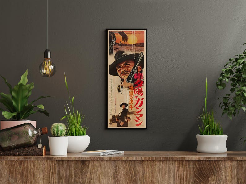 a framed poster of a cowboy on a wall, surrounded by potted plants and other decorative items.