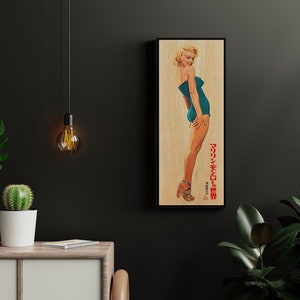 a picture of a woman in a bathing suit hanging on a wall